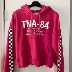 aritzia TNA hot pink cropped hoodie